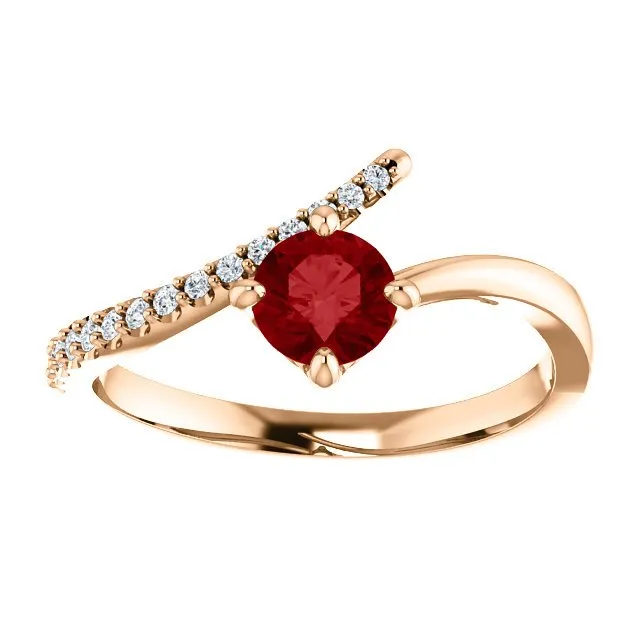 14KT GOLD 2/3 CT RUBY & 1/10 CTW DIAMOND BYPASS RING