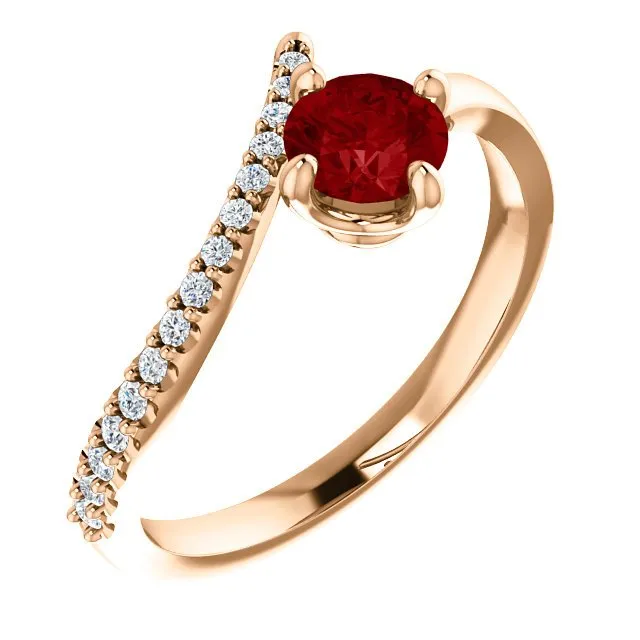 14KT GOLD 2/3 CT RUBY & 1/10 CTW DIAMOND BYPASS RING