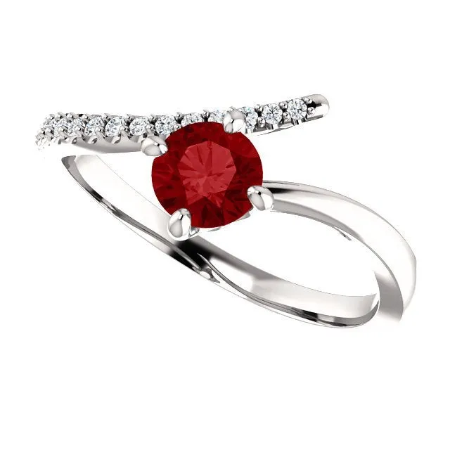 14KT GOLD 2/3 CT RUBY & 1/10 CTW DIAMOND BYPASS RING