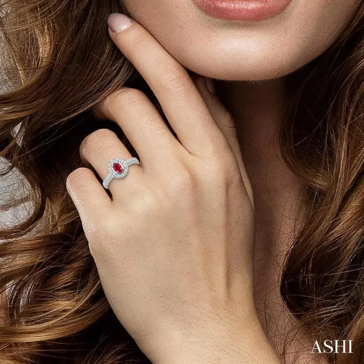 5x3mm Oval Cut Ruby and 1/10 Ctw Single Cut Diamond Ring in 10K White Gold.