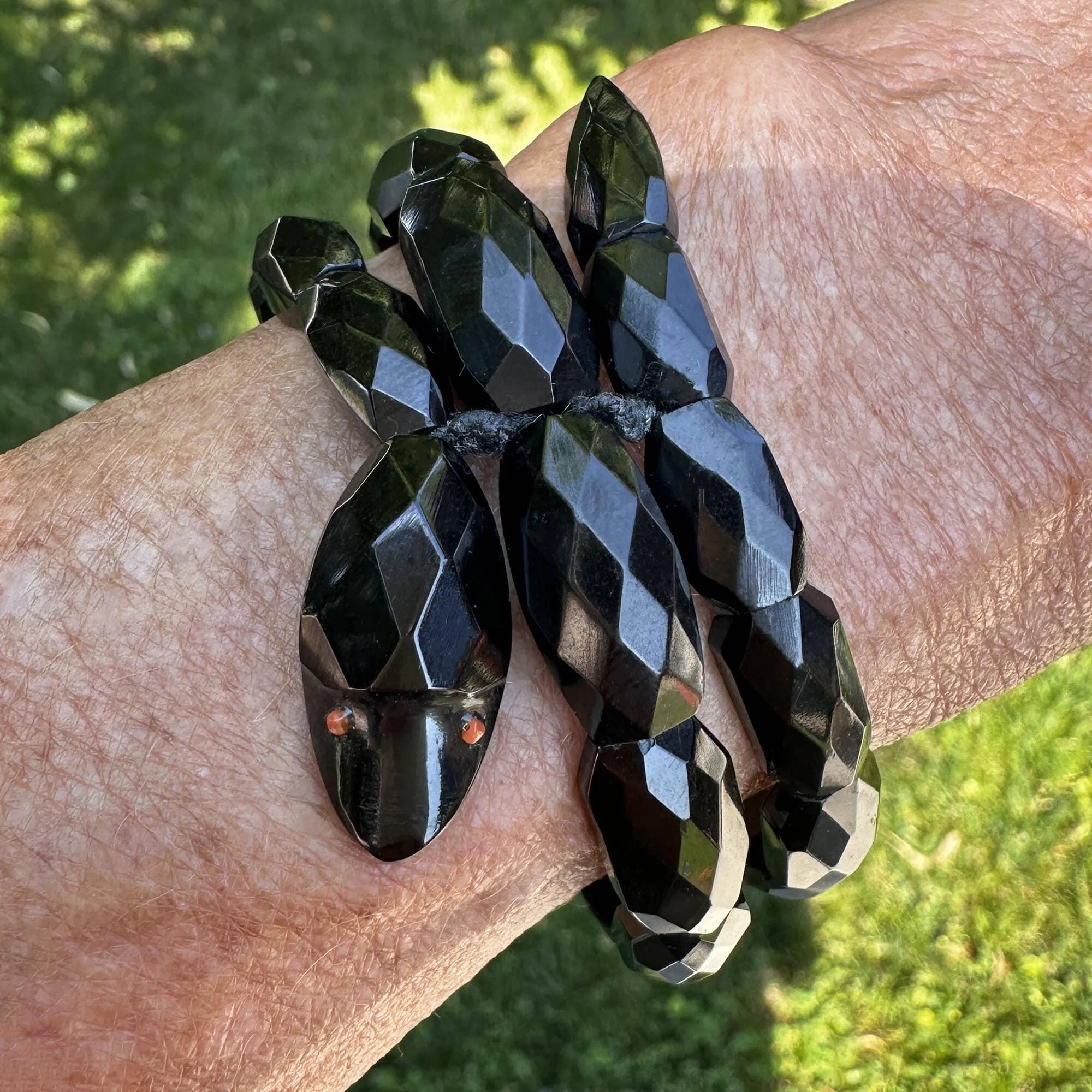 Antique Victorian Coral Eyed Whitby Jet Snake Bracelet