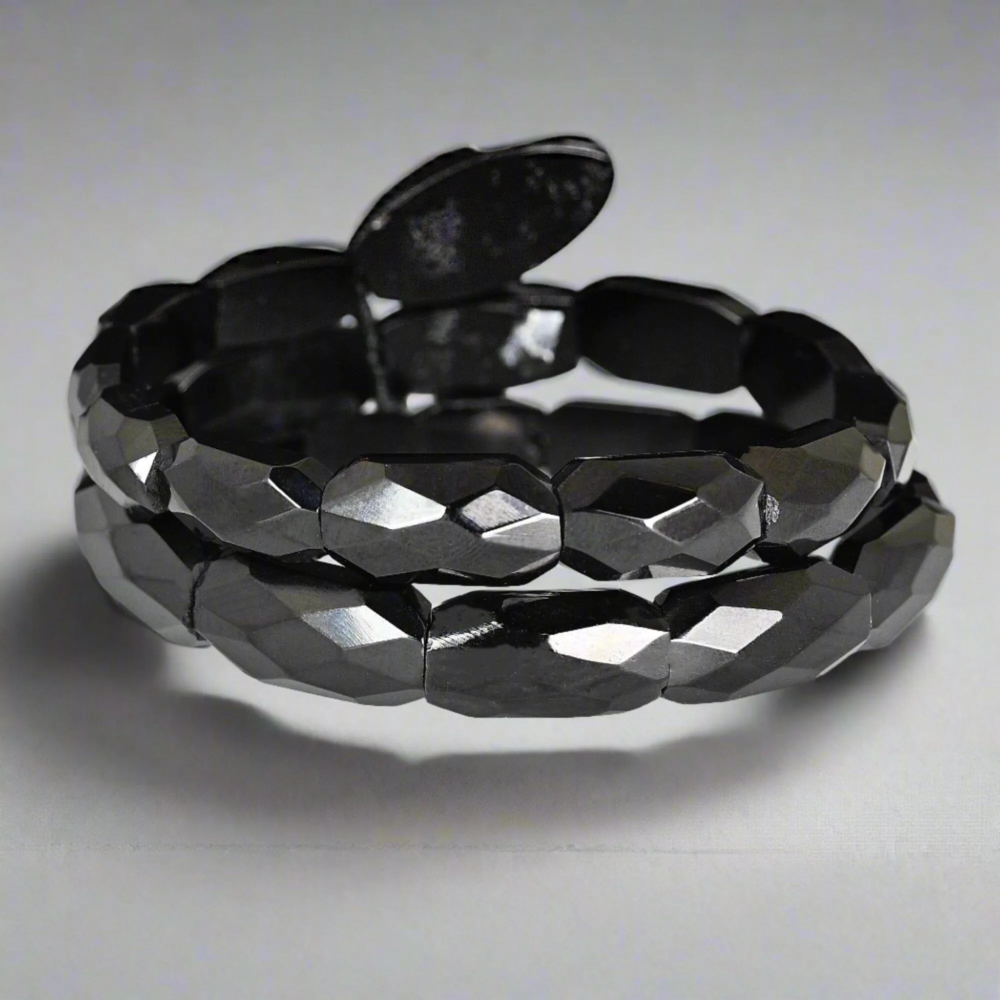 Antique Victorian Coral Eyed Whitby Jet Snake Bracelet