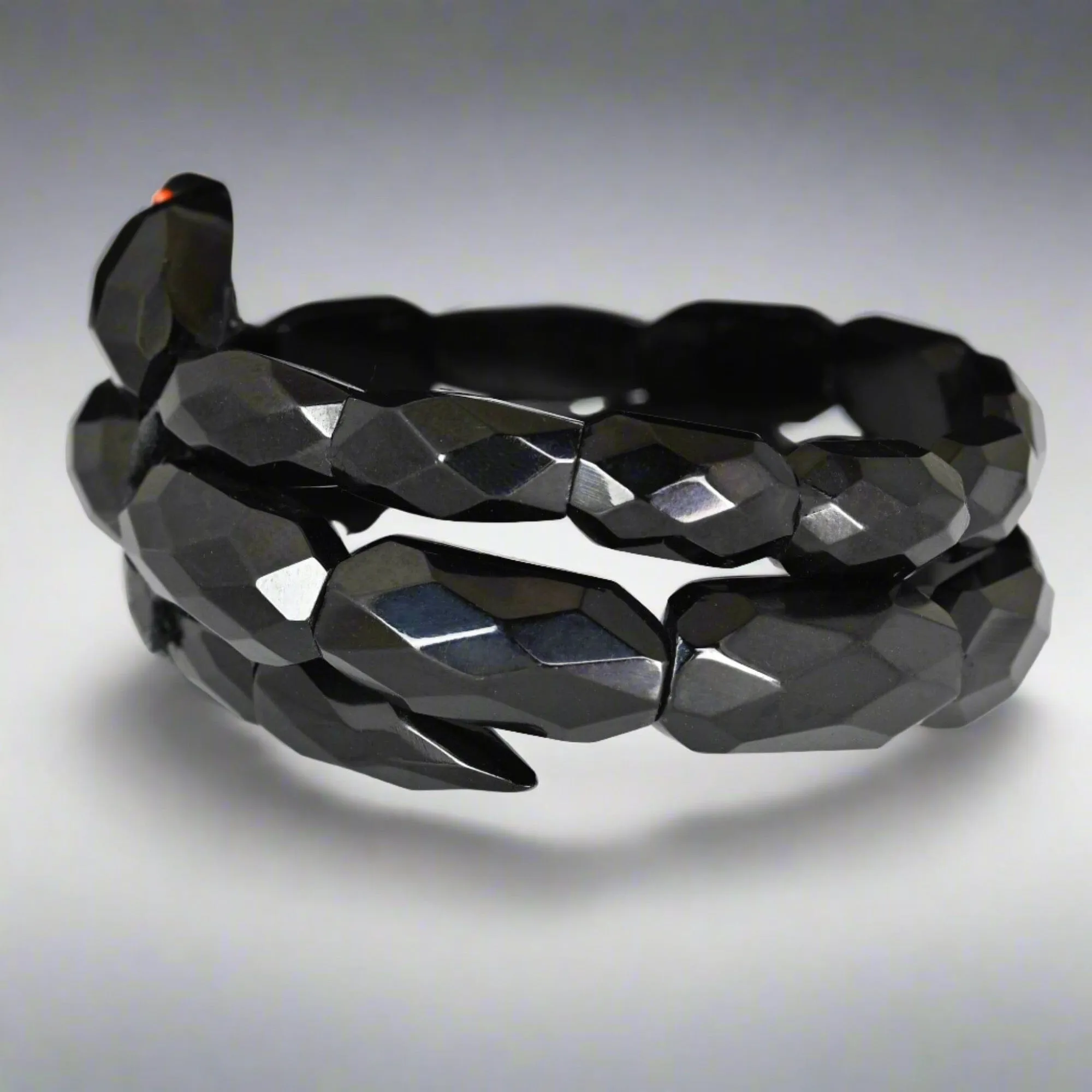 Antique Victorian Coral Eyed Whitby Jet Snake Bracelet