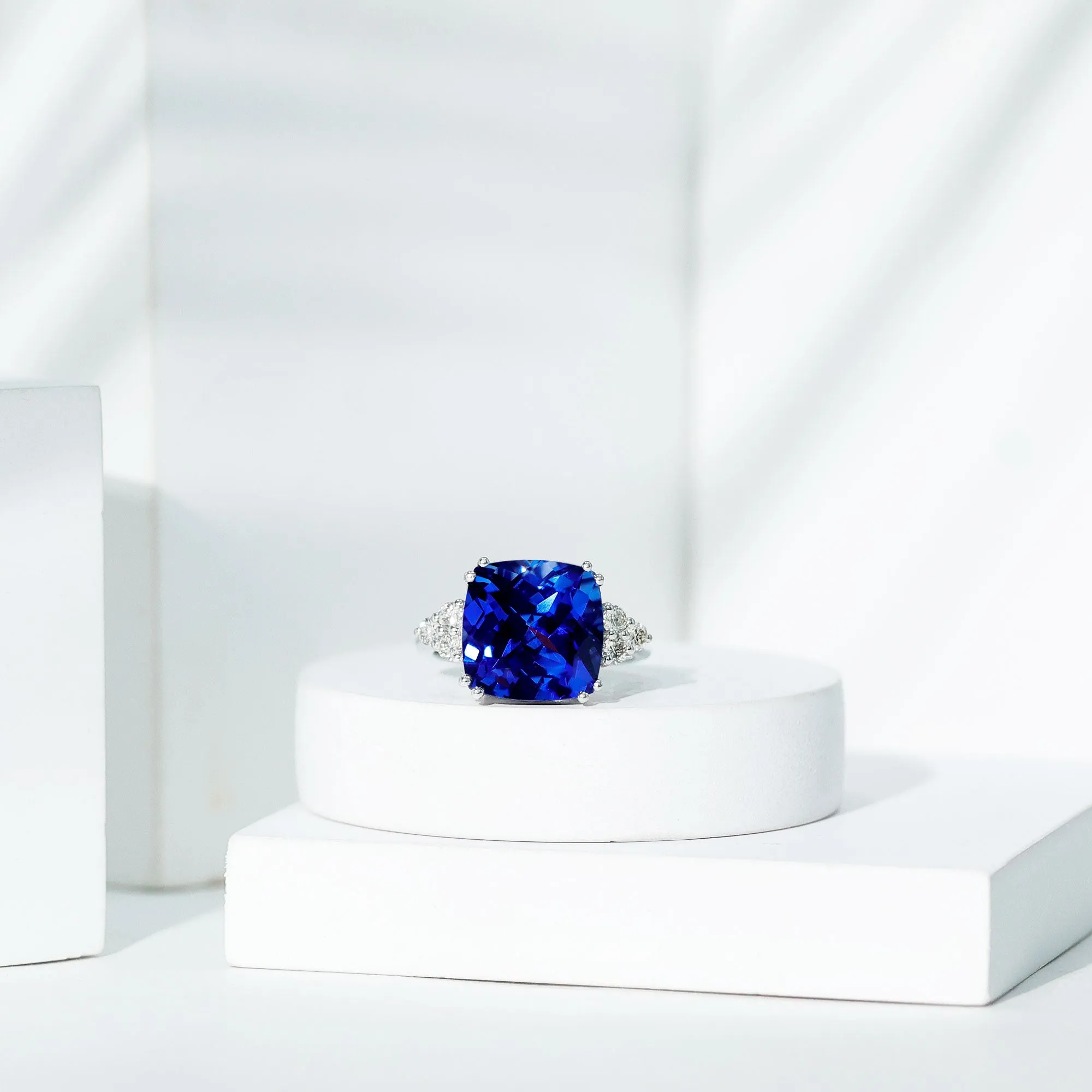 Created Blue Sapphire Solitaire Engagement Ring with Diamond Trio