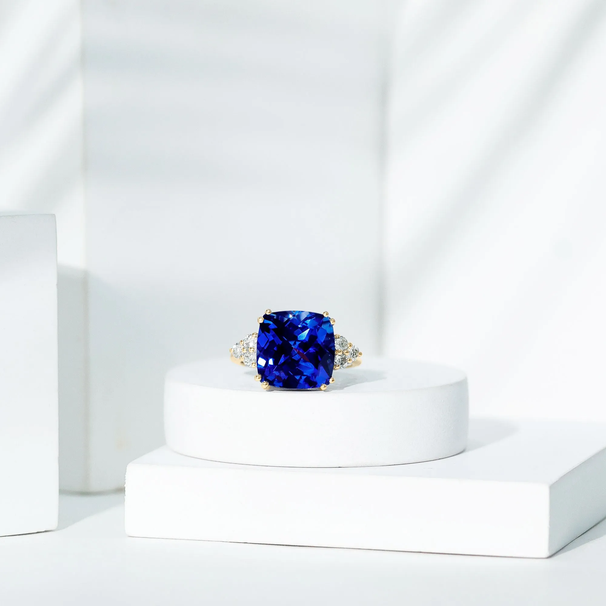 Created Blue Sapphire Solitaire Engagement Ring with Diamond Trio