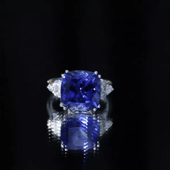 Created Blue Sapphire Solitaire Engagement Ring with Diamond Trio