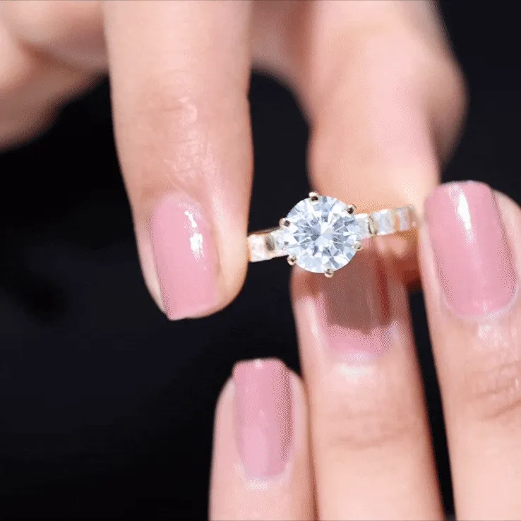 Round Moissanite Solitaire Engagement Ring with Princess Cut Side Stones