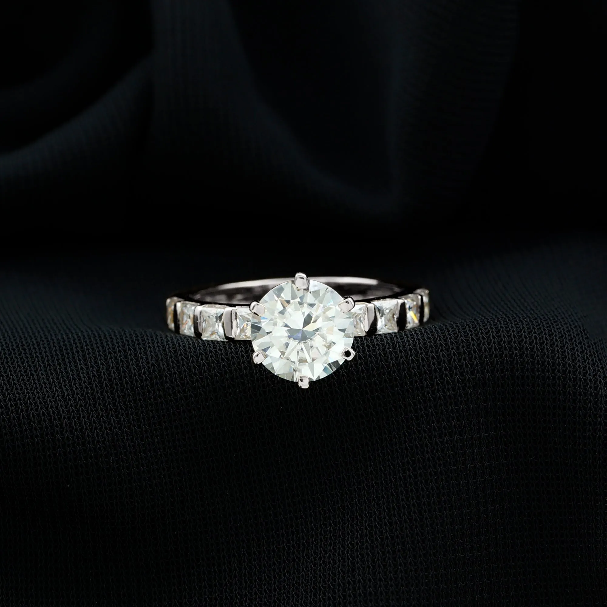 Round Moissanite Solitaire Engagement Ring with Princess Cut Side Stones
