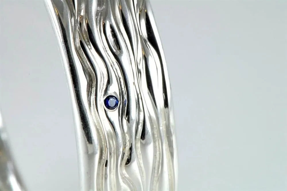 Sterling Silver Bangle Bracelet With Six Small Blue Sapphires