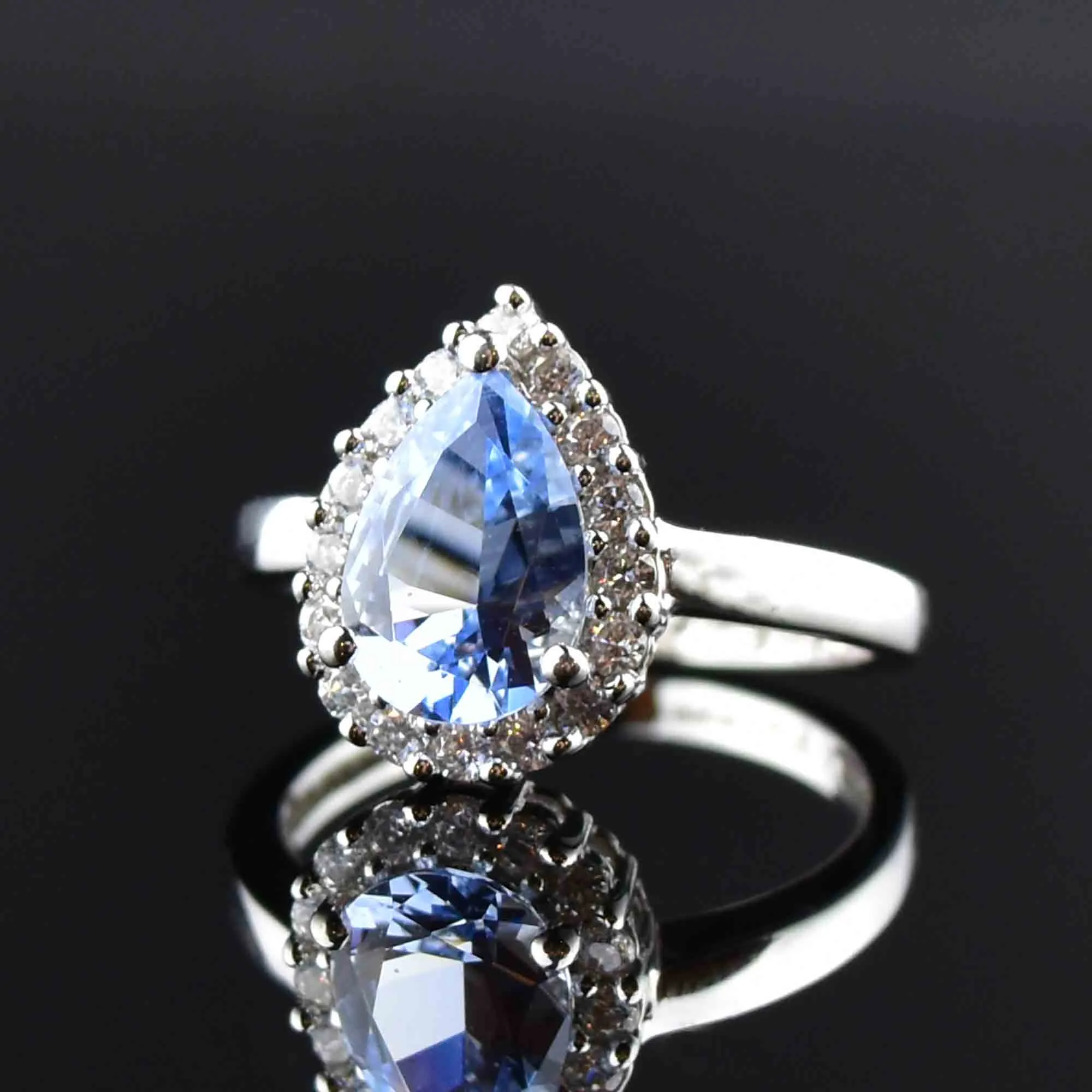 Vintage Sterling Silver Pear Cut Blue Topaz Halo Ring
