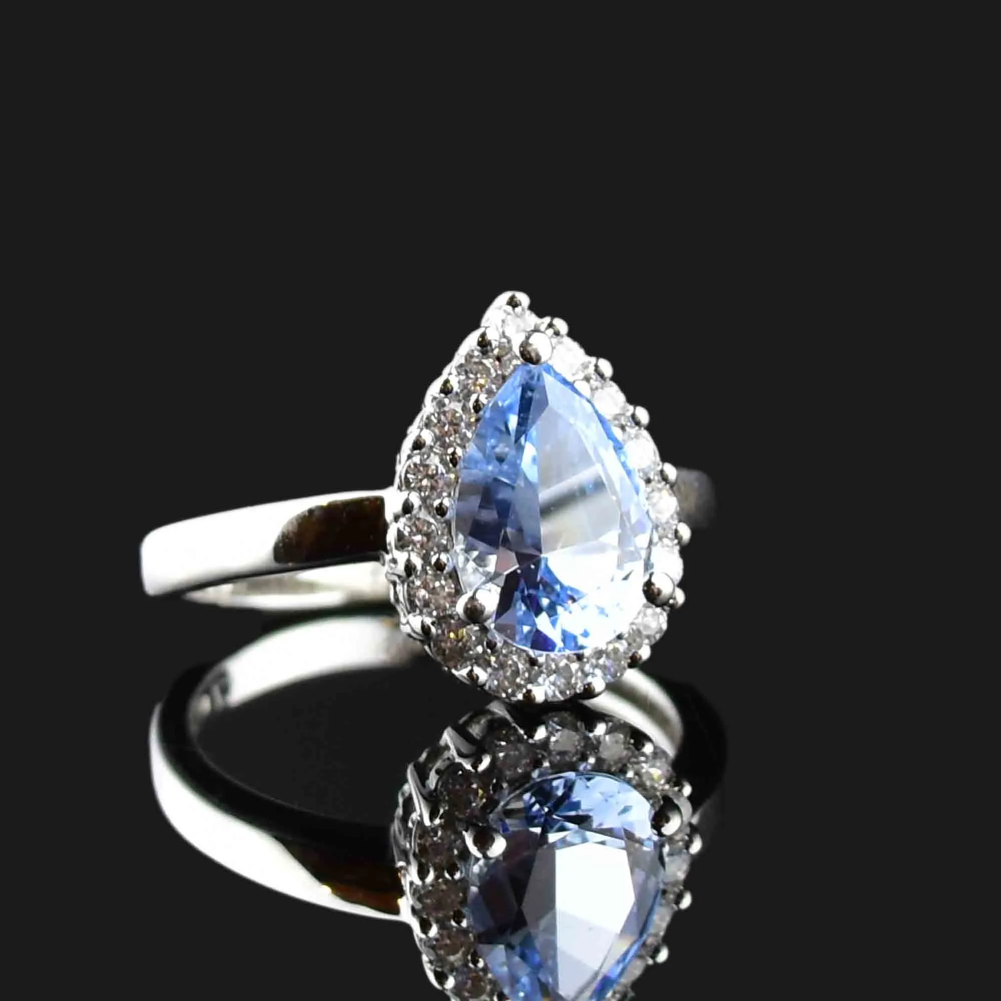 Vintage Sterling Silver Pear Cut Blue Topaz Halo Ring
