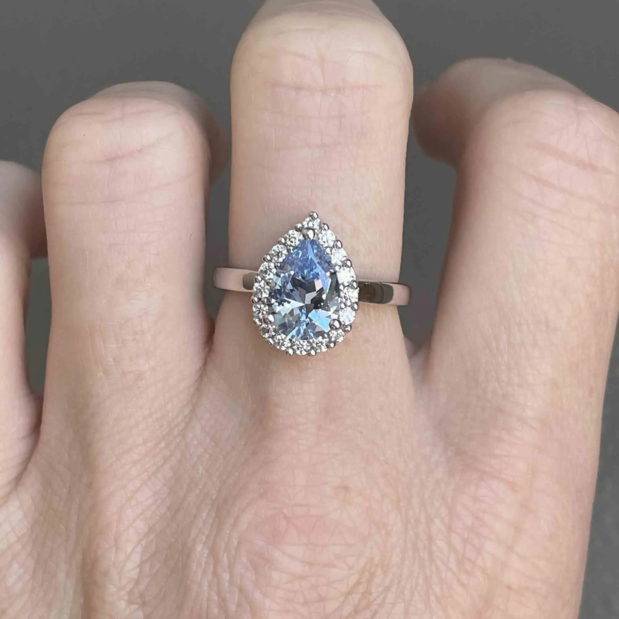 Vintage Sterling Silver Pear Cut Blue Topaz Halo Ring