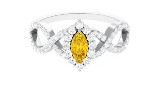 Yellow Sapphire Crossover Engagement Ring with Diamond Halo